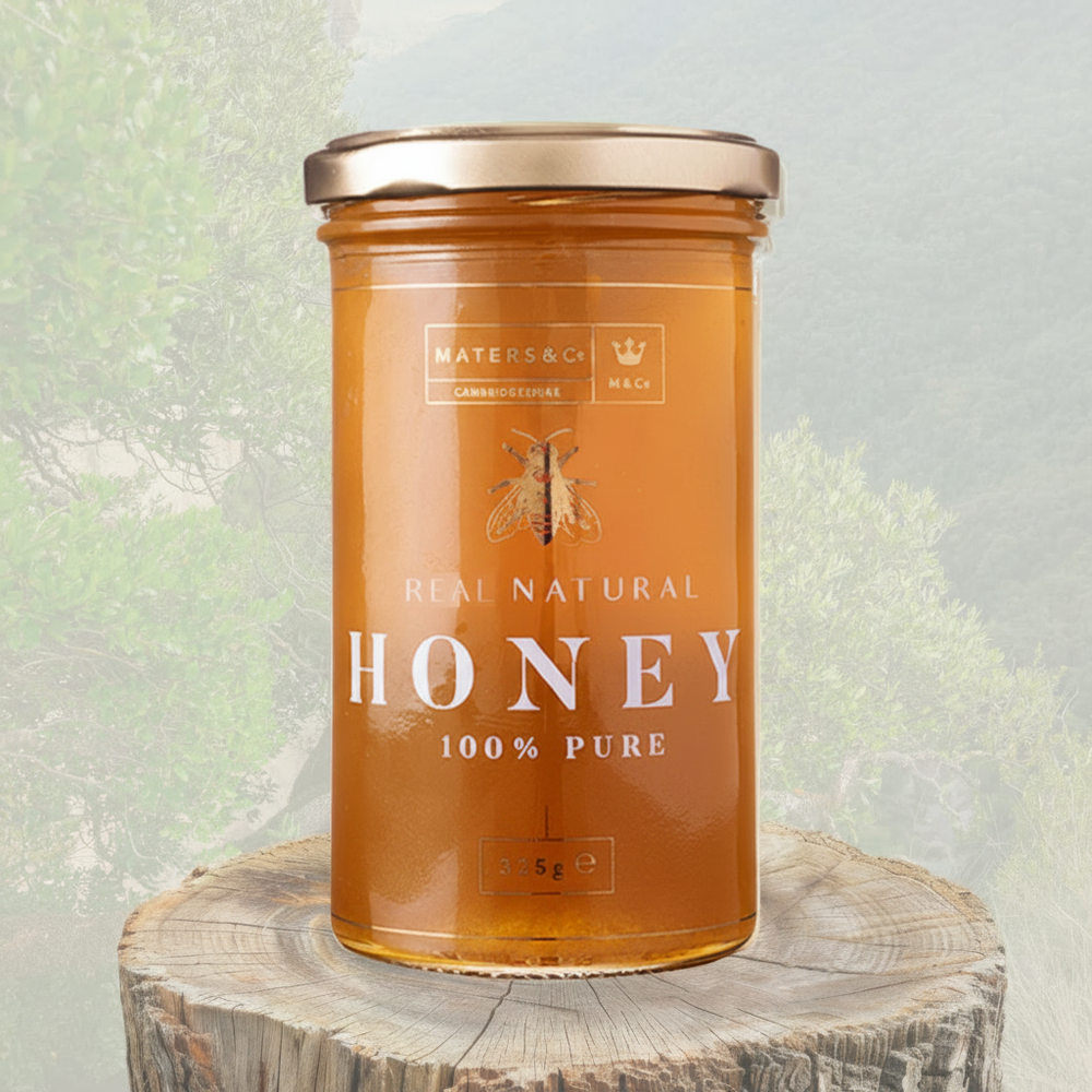 Jar of maters and co blackberry blossom 325g honey on a wooden surface