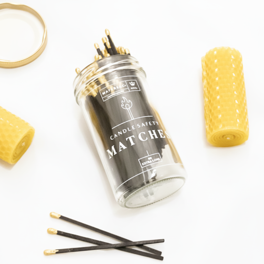 Luxury Extra Long Candle Matches Jar sitting on a white background next to beeswax candles.